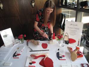 Resoling with a Save Your Sole red rubber sole on Christian Louboutin Shoes